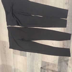 two pairs black leggings